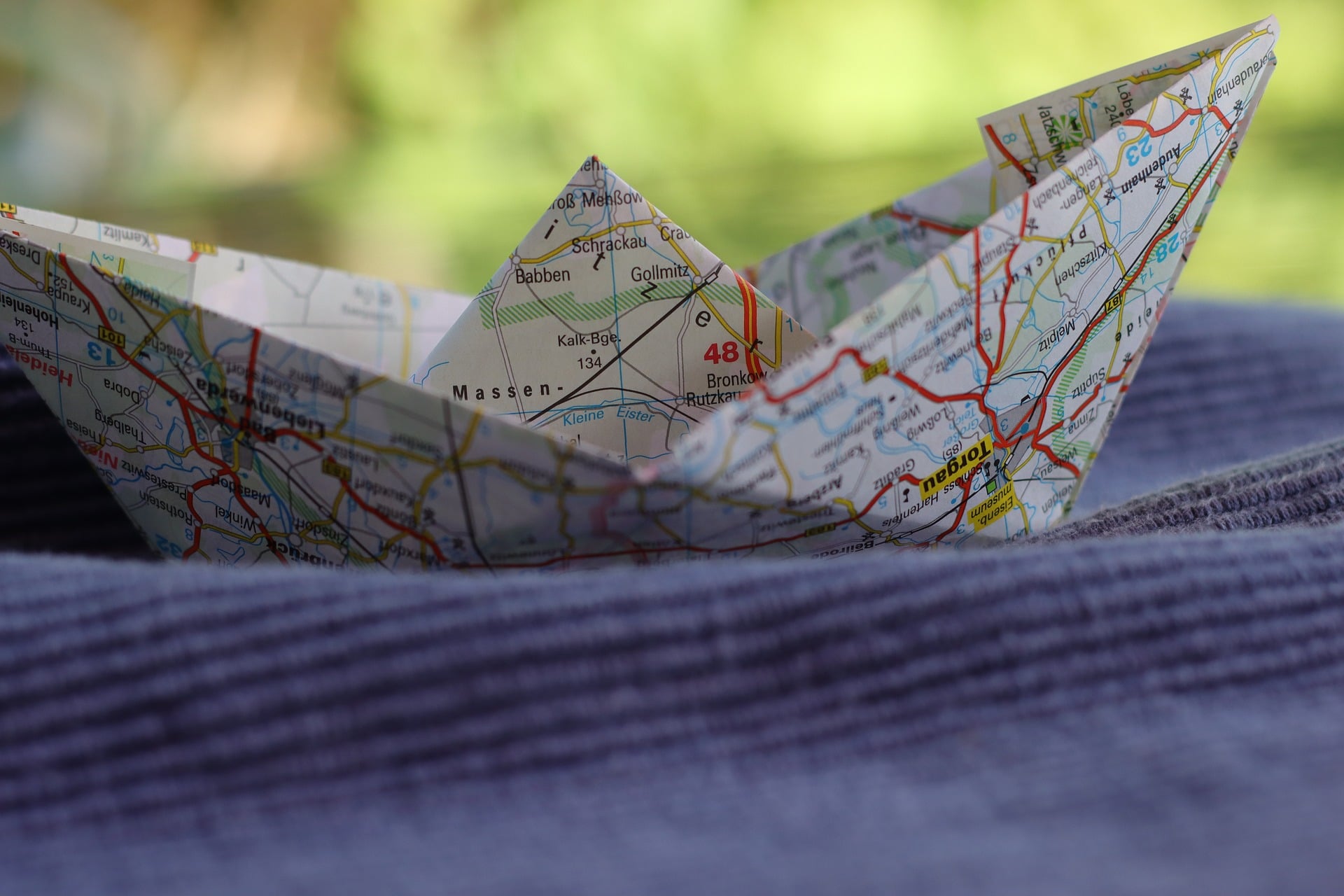Origami boat folded from a map